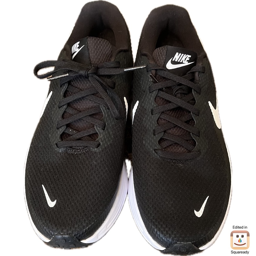 Nike Revolution Woman’s Black and White Running Shoes